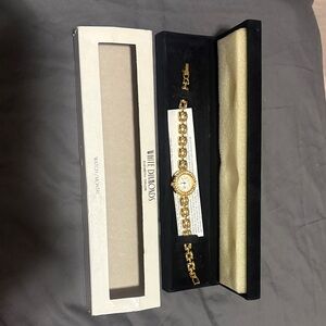 Elizabeth Taylor White Diamonds Gold Watch
